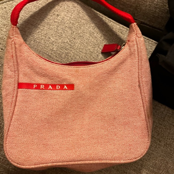 Prada bag
Several small stains on bag. - Picture 2 of 2
